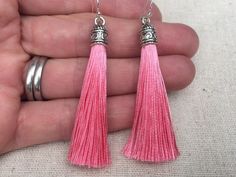 "Chic pink tassel earrings! They would add a pop of color to any outfit for any occasion. Dress them up or down. They are timeless and versatile. They are lightweight, fun and unique! The tassels measure 2 1/8\" long by 1/4\" wide. They hang from simple silver ear wire hooks. Overall drop length is about 2 1/4\". Metal is allergy free plated silver. These are my latest creation! I have them available in many colors! Find them all under the category tassel earrings in my shop. Thanks for stopping Pink Tassel Earrings For Gift, Pink Tassel Jewelry As A Gift, Acorn Jewelry, Pink Statement Earrings, Green Tassel Earrings, Pink Tassel Earrings, Gifts Pink, Lover Jewelry, Silver Statement Earrings