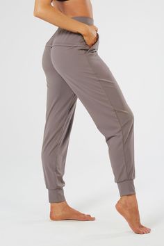 DESCRIPTION Nama Move four way stretch, brushed performance knit gives this sporty jogger a sleek slim fit, dropped crotch, slouchy pockets, tapered hem and high-waist for both high performance and comfort! Smooth cuffs and flat-laying, elastic-free waistband for optimal comfort. WE DESIGNED THIS FOR: Made for yoga, barre, Pilates, spin, running, cross-fit and everything in between, while comfortable enough for all life-ware moments. FABRIC & FIT Nama Move Technical Knit is so buttery soft a Yoga Athleisure Joggers, Yoga Sportswear Joggers With Relaxed Fit, Functional Go-dry Joggers For Yoga, 4-way Stretch Athleisure Joggers For Yoga, Casual Full-length Yoga Joggers, Slim Fit Joggers, Sweat Joggers, Running Pants, Joggers Outfit