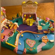 a toy house with lots of furniture and accessories