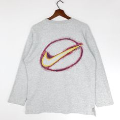 Vintage Nike Swoosh Sweatshirt Crewneck Nike Swoosh Big Logo Pullover Jumper Size Medium by ClockworkThriftStore on Etsy Nike Crew Neck Vintage, Nike Crewneck Sweatshirt Vintage, Nike Retro Crewneck, Vintage Nike Sweatshirt Navy, Nike 1990 Vintage Hoodie, Vintage Nike Sweatshirt, Nike Pullover, Nike Sweatshirts, Vintage Nike