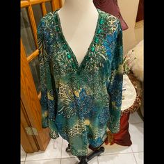 New Without Tags Perfect Conditionnever Worn Raviya Beaded & Jewel V Neck Green/Black Long Sleeve Tunic Shirt Sz L 100% Polyester Nwnt. Nice Beaded & Jewel Long Sleeve Tunic Shirt. Long Sleeve. Green/Black/White/Blue. Never Worn. Pit To Pit 22.5 Length 30 Festive Embellished V-neck Top, Bohemian Embellished V-neck Blouse, Green Sequined Long Sleeve Top, Green Long Sleeve Sequin Top, Festive Green Tunic Top, Green Embellished Long Sleeve Blouse, Embellished Green Long Sleeve Blouse, Bohemian Green Tops For Festive Occasions, Bohemian Sequin Top For Spring