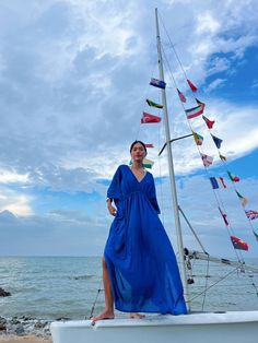 Discover the beauty of our Andaman Kaftan in Royal Blue, a versatile piece designed for your next escape. With inspiration from the vibrant ocean and sky, this oversized kaftan dress brings together elements of comfort, elegance, and timeless style. Whether worn as a maxi dress, beach cover-up, or wrap kimono dress, it effortlessly adds vacation vibes to any outfit. Made from modal viscose and ethically sourced, it not only elevates your style, but also represents a conscious choice. Complement Blue Breezy Flowy Cover-up, Blue Flowy Breezy Cover-up, Blue Flowy Cover-up For Beach Season, Breezy Blue Maxi Dress For Beach Season, Flowy Blue Maxi Beach Dress, Blue Breezy Maxi Beach Dress, Blue Breezy Maxi Dress For The Beach, Blue Flowy Cover-up With Kimono Sleeves, Blue Long-sleeved Beach Dress