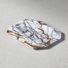 a marbled object sitting on top of a table