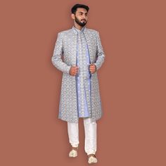 sherwani of 100% thread weaving for all kind of occasions  chikankari (Lucknowi ) work sherwani in peach colour Wedding sherwani for Groom and groom Men  Indian plain brocade  sherwani designer party wear men's ethnic suit   Care instruction: dry clean  Top color:  fabric: silk base + cotton (thread weaving)  Package include:  Style- ethnic wear Top- sherwani jacket Bottom- churidar pants included Material- silk base  Product size guidance: please refer to chest size measurement in the size chart for your correct size  Slightly colour variation may be there due to camera resolution Jamawar Nehru Jacket With Chikankari Embroidery For Transitional Season, Transitional Jamawar Nehru Jacket With Chikankari Embroidery, Diwali Bandhgala With Chikankari Embroidery, Traditional Drape Jamawar Sherwani With Chikankari Embroidery, Chikankari Embroidery Jamawar Sherwani With Traditional Drape, Traditional Jamawar Nehru Jacket With Chikankari Embroidery, Traditional Drape Nehru Jacket With Chikankari Embroidery, Ceremonial Bandhgala With Chikankari Embroidery For Eid, Ceremonial Bandhgala With Chikankari For Diwali