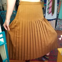 Wow. This Is Just...Wow. Original Nwt Lilli Ann Collections Highwaisted Pleated 70s Does 50s Mocha Colored Skirt. Backside Has Elastic At Waist. Hidden Zipper And Side Button. Has Some Slight Discoloration On Top Left Waist Area. Not Sure What? Might Just Need A Cleaning. Other Than That, Crazy Good Condition! No Pockets. Feels Like A Poly Blend. 15in Waist And 30in Length. Best Fit A L/Xl. Pls Ask Any Questions! Spring Full Length Fitted Pleated Skirt, Retro High-waist Pleated Skirt For Spring, Retro High Waist Pleated Skirt For Spring, High Waist Retro Pleated Skirt For Spring, High-waist Fitted Brown Pleated Skirt, Brown Fitted High-waist Pleated Skirt, Brown Fitted High Waist Pleated Skirt, Retro Fitted Skirt Bottoms, Retro Fitted Skirt