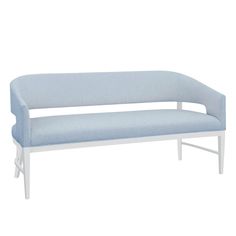 a light blue bench sitting on top of a white floor