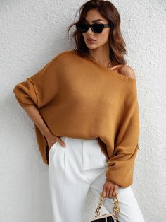 Update your knitwear collection with this oversized sweater boasting a relaxed silhouette and a solid ginger tone. Size Guide: Melina is 5’6” tall, and has a 33.5” bust, 24.8”waist, & 37.4” hips. She is wearing a S / US 4 / AU 8. This sweater is true to size. Material: 100% acrylic. Care Instructions: Machine wash / Cold hand wash Relaxed Fit Sweater With Drop Shoulder For Fall, Relaxed Fit Fall Sweater With Drop Shoulder, Relaxed Fit Drop Shoulder Sweater For Fall, Fall Drop Shoulder Sweater, Trendy Drop Shoulder Fall Sweater, Oversized Drop Shoulder Sweater For Fall, Oversized Solid Color Knit Top For Fall, Brown Chunky Knit Long Sleeve Tops, Oversized Solid Color Knit Top With Crew Neck