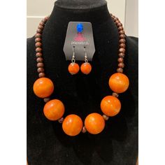 Orange Wooden Bead Necklace With Matching Earrings. Cheap Orange Necklaces With Wooden Beads, Orange Beaded Necklaces With Wooden Beads As Gift, Orange Beaded Necklaces With Dangling Beads For Gift, Orange Beaded Necklaces With Wooden Beads For Gifts, Orange Beaded Necklace With Dangling Round Beads, Orange Necklaces With Dangling Beads As Gift, Casual Orange Jewelry Gift, Orange Necklaces With Dangling Beads For Gifts, Orange Jewelry With Large Beads As A Gift