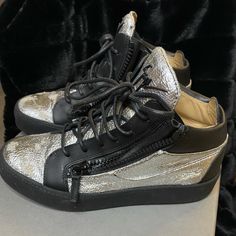 Authentic Italian Made Giuseppe Zanotti Sneakers. Perfect Condition And Worn Maybe Once Or Twice. Made With Real Leather. Silver Custom Lace-up Sneakers With Rubber Sole, Silver Lace-up Custom Sneakers With Rubber Sole, Custom Silver Lace-up Sneakers With Rubber Sole, Silver Leather Low-top Custom Sneakers, Silver Metallic Leather Sneakers With Round Toe, Metallic Silver Leather Sneakers With Round Toe, Luxury Silver Sneakers With Rubber Sole, Modern Silver High-top Custom Sneakers, Luxury Silver Leather Sneakers