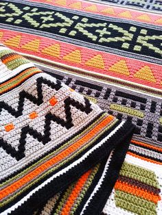 the colorful rugs are knitted together and ready to be placed on the floor