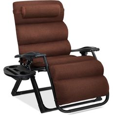 a brown reclining chair sitting on top of a black metal frame and foot rest