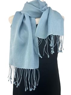 Beautiful 70% Pashmina and 30% Silk blend unisex neck scarf.  12"W X 60"L Hand wash or Dry Clean A timeless piece of accessory, this beautiful pashmina silk blend neck scarf will simply and effortlessly dress up and add style and class any outfit or coat. Folds and fits into your purse and wrinkles fall off easily. Perfect accessory for spring fall and winter. A must have beautiful versatile affordable piece of luxury.  Colour Accuracy: I have tried to capture the colours accurately however it m Elegant Blue Shawl For Spring, Classic Blue Scarf For Fall, Elegant Blue Scarves For Fall, Elegant Blue Scarf For Winter, Elegant Blue Shawl For Fall, Elegant Blue Winter Scarf, Elegant Blue Fall Shawl, Classic Solid Color Pashmina Scarves, Classic Solid Color Pashmina Scarf