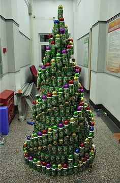 a large christmas tree made out of cans