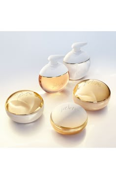 What it is: A shimmering body scrub that illuminates skin with pearlescent pigments and 24k-gold particles, and perfumes skin with the notes of J'adore.What it does: Apply the scrub in a moment of sensory indulgence. The texture transforms into a milky oil, releasing notes of J'adore, the iconic Dior perfume for women. The exfoliator is infused with cotton extract and golden shimmer for soft, illuminated skin. The scent of the fragrance will linger all day.Notes:- Top: pearlescent pigments, gold particles- Middle: jasmine extracts- Base: cotton extracts Made in France Dior Natural Glow Set, Dior Jadore, Makeup Package, Dior Perfume, Body Gel, Hydrating Cream, Floral Notes, Floral Scent, Xanthan Gum