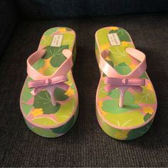 In Good Condition, However, There Is A Small Flaw As Shown In The Second Picture, But Nothing Too Noticeable. It Can Possibly Be Fixed. These Sandals Were Never Worn. Both Pairs Have Size Sticker On The Bottom Of The Shoe Bundle & Save Sandals That Cover Big Toe, Pink Wedge Sandals For Vacation, Pink Synthetic Wedge Sandals For Beach Season, Pink Wedge Sandals For Beach Season, Pink Platform Flip Flops For Summer, Pink Platform Flip Flops For Beach, Pink Platform Flip Flops For Spring, Spring Platform Pink Flip Flops, Casual Pink Wedge Sandals For Beach