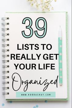 a spiral notebook with the words 39 lists to really get your life organized on it