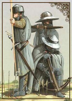 two men dressed in medieval armor holding swords