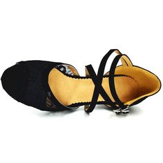 a pair of black shoes with laces on the bottom and heel, tied together