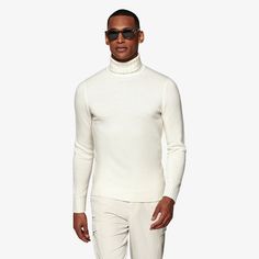 A classic style in a luxurious cashmere blend, this off-white turtleneck sweater is a richly structured and elegantly simple addition to your winter wardrobe whether it's on its own or under a tailored jacket. Luxury White Sweater For Work, Luxury White Sweater For Workwear, Classic White Funnel Neck Sweater, Formal Beige Sweater For Winter, Classic White Long Sleeve Turtleneck, Fitted Winter White Sweater For Workwear, Winter Beige Sweater For Formal Occasions, Elegant White High Neck Turtleneck, Luxury White Sweater For Fall