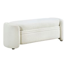 an upholstered white couch with wheels