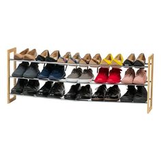 the shoe rack is filled with many pairs of shoes