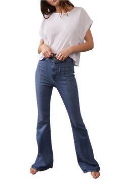 Retro-inspired flares and flattering pleats add dimension to a pair of scene-stealing jeans finished with a high rise and a hint of stretch. 33 1/2" inseam; 23" leg opening; 12 1/2" front rise; 16" back rise (size 29) 91% cotton, 7% polyester, 2% elastane Dry clean or machine wash, tumble dry Imported Mid-rise Blue Flares For Fall, Fitted Flare Jeans In Medium Wash, Chic Blue Fitted Flares, High Rise Blue Flares For Fall, Fitted Wide Leg Denim Blue Flares, Blue High-rise Fitted Flares, Blue Fitted High Rise Flares, Retro Mid-rise Stretch Flares, Fall Medium Wash Flare Jeans