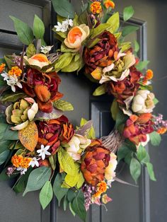 This elegant fall peony wreath will dress up your front door, mantel, bed frame windows etc. for the season. Let your guests be greated with a cheerful autumn wreath on your front door.  Wreath pictured is approximately 26 inches in diameter measured from leaf tip to leaf tip. Perfect for a standard front door. If displaying outdoors, recommend under a covered patio and brought inside during harsh weather. Peonies Wreath, Elegant Fall, Orange Cream, Autumn Wreaths, Fall Floral, Covered Patio, Fall Wreaths, Burnt Orange, Door Wreath Hanger