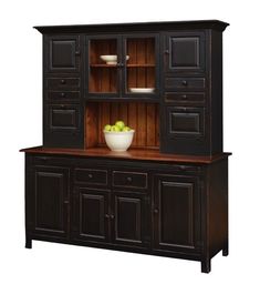 a black china cabinet with two drawers and a bowl of fruit on top in front of it