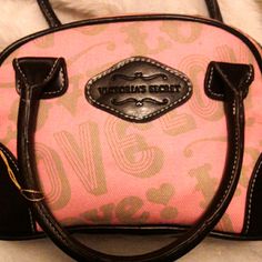 Victoria's Secret Cosmetic Bag Pink & Mint Green Design Pattern Black Leather Handles & Stitching On Bottom Corners For Support New With Tag Gift Just Never Used Versatile Use- Could Be Used For A Purse For Your Daughter (Any Age) 5"X10"X3" Pink Rectangular Victoria's Secret Bag, Vintage Pink Shoulder Bag With Handles, Pink Vintage Shoulder Bag With Handles, Casual Pink Victoria's Secret Bags, Victoria's Secret Pink Shoulder Bag, Victoria's Secret Pink Pouch Bag, Pink Pouch Satchel For Errands, Pink Pouch Satchel, Vintage Pink Shoulder Bag For Everyday