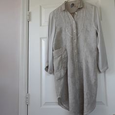 Brand New Without Tags!! Pics Dont Do Justice For Sure!!! Factory Color Distressed Linen/Vicose Sleeves...Fabric Tag In Pics..Can Wear As Dress Or Tunic...Large Pocket In Front..3/4 Sleeve..Color Is A Pale Taupey Beige..Made In Italy..Full Button Down Front..Size Is Medium..Measures Flat Across 20"..Length 39"..Has Both Front And Back Seaming For Nice Fitted Look..Really Nice!! Fabric Tags, Really Cool Stuff, Tunic Tops, In Italy, Womens Tops, Italy, Brand New, Tags, Fabric