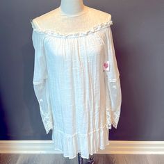 Size Medium Long Sleeve Romper Dress. Perfect For Any Occasion. Ivory W / Lace Sleeves. Too To Bottom 28” Long Flowy Off-white Dress With Lace Trim, Flowy Off White Dress With Lace Trim, White Off-shoulder Dress For Day Out, Off-white Dresses With Lace Trim For Day Out, Off White Lace Trim Dress For Day Out, Off White Dresses With Lace Trim For Day Out, White Off-shoulder Mini Dress For Daywear, Off-white Flowy Dress For Daywear, Feminine Off-white Dresses For Daywear