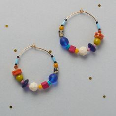 Colorful Hoop Earrings, with a Stainless steel earring plated with a 18K gold. We use this material to ensuring your comfort and safety.  They were designed with carefully selected Czech glass beads some Natural stones and  Crystal beads ,creating a delightful combination.  Please note that the beads used in these earrings may vary slightly, adding to their unique charm.  ITEM DETAILS:  35mm hoops Gold plated hoops Earring post are lead and nickel free. I will prepare a pair of earrings for you, please note that they are made to order, and it could take a few days to process. They will came nice packaged in a Velvet Bag and a small Box, to protect them  during the shipment. Care recommendations: Polish off your jewelry using a soft polishing cloth. This will help maintain its shine. Safe i Everyday Multicolor Nickel Free Earrings, Everyday Small Hoop Beaded Earrings, Multicolor Beaded Earrings With Dangling Beads For Everyday, Colorful Small Hoop Earrings With Ear Wire, Everyday Multicolor Beaded Earrings With Dangling Beads, Small Hoop Earrings With Dangling Beads As Gift, Colorful Dangle Hoop Earrings With Ear Wire, Multicolor Beaded Earrings For Everyday, Everyday Multicolor Jewelry