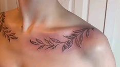 a woman's chest with leaves on it