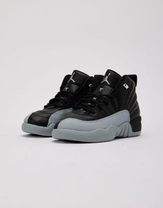 Feel like part of the team with the new Air Jordan 12 Retro "Black Wolf Grey." This new colorway boasts a black tumbled leather base with "Wolf Grey" accents. Tumbled leather upper Pebbled leather mudguards Traditional lacing system Padded tongue with Jumpman branding Heel tabs for easy on-and-off Jordan branding at he Air Jordan 12, Graphic Tee Outfits, Air Jordan 12 Retro, Jordan Air, Jordan 12 Retro, Jordan 12, Jordans 12, Black Wolf, Fall Fits