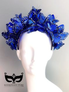 From our Whimsical Collection, this elegant women's headpiece features butterflies perched on a comfortable satin headband base with butterflies. Pictured are Blue and orange monarch butterflies; you have the option to pick others butterfly colors as well. I N C L U D E D Satin headband base topped with high quality intricately detailed feather butterflies. S H I P P I N G - Processed same day or within 24 hours. 1-2 day guaranteed delivery, add item to cart, click shipping tab for rates. Pls le Adjustable Blue Costume Hats For Carnival, Carnival Adjustable Headpiece With Matching Headband, Blue Headpiece For Party, Blue Adjustable Costume Hats For Carnival, Adjustable Headband For Masquerade, Adjustable Headpieces For Carnival, Summer Carnival Headband Headpieces, Blue Headpieces For Carnival, Adjustable Blue Headpieces For Festivals