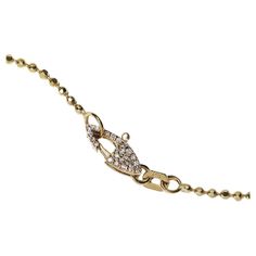 A solid 14k gold diamond cut ball chain featuring a custom pavé double-sided diamond clasp. We love this style because the detailed diamond cut of the chain creates a noticeable sparkle with the slightest movement. Can be styled with the diamond clasp in the front, back, layered, or paired with a pendant of your choice. Suitable for all ages. Made by hand in Los Angeles, California. Designed and constructed for everyday wear—feel free to leave on in the shower, sleeping, and even a dip in the oc Friday Holiday, Gold Link Necklace, Synthetic Diamond, White Gold Necklaces, Modern Necklaces, Yellow Gold Chain, Timeless Jewelry, Chain Link Necklace, Link Necklace