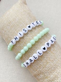 Set of 3 Bracelets Beads are acrylic This is a ready to ship pre made set Adult average 7 inch length If you want to do a custom order and build your own set with different colors or letter styles or a different size you can do so on this listing in my shop https://www.etsy.com/listing/857637418/personalized-custom-beaded-word-name?ref=shop_home_active_1&pro=1 Trendy Words, Rave Bracelets, Letter Styles, Pony Bead Bracelets, Bracelets Beads, This Too Shall Pass, Word Bracelet, Pony Beads, Christmas Wishlist