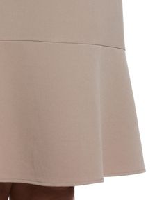 Take your office style up a notch with this essential A-line skirt from Rafaella. This women’s skirt has a flattering ruffled hem which added a bit of flounce and flourish to the knee-length style. Gabardine fabrication is tough and tightly woven which makes the style durable and gives its structure, while added stretch lets you move with ease and keeps you comfortable. Pair with the Plus Size Cropped Angled Open Blazer in Summer Straw or black. 62% Polyester / 33% Rayon / 5% Spandex Flattering Chic Spring Skirt With Flared Hem, Spring Chic Skirt With Flared Hem, Elegant Knee-length Ruffled Bottoms, Chic Skirt With Lined Flared Hem, Elegant Relaxed Mini Skirt With Ruffles, Elegant Solid Color Skirt With Ruffle Hem, Elegant Solid Skirt With Ruffle Hem, Feminine Knee-length Skirt For Workwear, Feminine Knee-length Skirt For Work