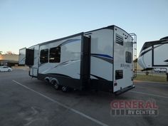 an rv is parked in a parking lot