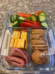 a plastic container filled with different types of food