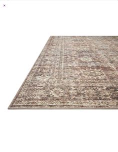 an area rug is shown on a white background with the colors of brown and beige