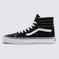 A Slender Take on Our Iconic High-Top ShoeOur legendary high-top shoe gets slimmed down with a deconstructed upper in the Sk8-Hi Tapered. With a more slender fit than the original Sk8-Hi, this laid-back take on an icon offers a streamlined look with plenty of style. Legendary high-top, Sidestripe™ shoe Slender silhouette Deconstructed canvas uppers Lace-up closure Metal eyelets Signature rubber waffle outsoles | Vans Sk8-Hi Tapered Canvas Shoes (Black/True White) - 4.5 Boys/6.0 Women Vans Toddler, Vans Store, High Top Shoe, Vans Kids, Black And White Shoes, White Vans, Vans Sk8 Hi, High Top Vans, Black High Tops