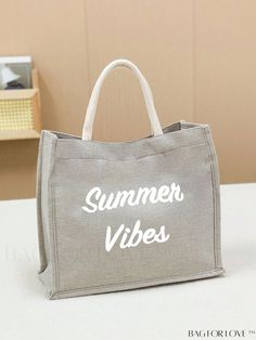 a bag that says summer vibes sitting on a white table next to a basket