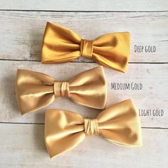 "We proudly present our premium handmade pre-tied bow tie for Adult/Men/Women/Kids/Children/Toddler/Baby boy/girl.... **The bow tie is pre tied and hand stitched into place.** Material: N/A Choose your Bow tie ATTACHMENT/STRAP: - CLIP-ON (strapless) - Adjustable VELCRO strap - Adjustable strap with METAL HOOK, EYE ADJUSTER HARDWARE SIZES are shown below: - NEWBORN-1YR : Adjustable straps fit 7\" up to 11\" neck circumference. - TODDLER (1-3YR) : Adjustable straps fit 10\"-12\" neck circumference Dapper Adjustable Tie With Satin Bow, Adjustable Gold Bow Tie And Suit Accessories, Adjustable Gold Bow Tie And Accessories, Gold Adjustable Bow Tie Suit Accessories, Adjustable Gold Bow Tie, Gold Satin Bow Tie, Adjustable Gold Bow For Black Tie Event, Gold Bow Ties For Black Tie Events, Gold Dapper Ties For Weddings