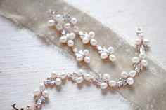 "Featuring a gorgeous combination of crystals and freshwater pearls, this bracelet and earrings set is the perfect piece to add to your bridal look for a touch of vintage meets modern glam! - Bracelet measures 6\" x 0.5\" - Earrings measure 2.5\" x 0.5\" - Made with high quality cubic zirconia and freshwater pearls - Available in rose gold, yellow gold and rhodium (silver) finishes Browse My Entire Shop For More Jewelry & Accessories: https://www.etsy.com/shop/TheExquisiteBride Browse My Sho Rose Gold Pearl Bracelets For Wedding, Wedding Pearl Bracelets In Rose Gold, Elegant Rose Gold Pearl Bracelet For Wedding, Mother Of The Bride Rose Gold Pearl Jewelry, Dainty Rose Gold Pearl Bracelet For Wedding, Rose Gold Bracelet Set, Vintage Meets Modern, Pearl Bracelet Wedding, Gold Pearl Bracelet