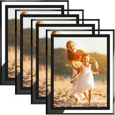 a set of five black frames with an image of a mother and daughter on the beach