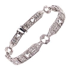 Vintage 1930's Art Deco Platinum Diamond Bracelet 3.00ct | See more rare vintage Retro Bracelets at https://www.1stdibs.com/jewelry/bracelets/retro-bracelets Vintage White Gold Hand-set Bracelets, Vintage White Gold Diamond Bracelet With Brilliant Cut, Vintage Diamond Bracelet With Hand-set Diamonds, Vintage Platinum Tennis Bracelet For Anniversary, Art Deco White Gold Diamond Bracelet With Brilliant Cut, Vintage Hand Set Diamond Bracelet, Art Deco Platinum Diamond Bracelet, Art Deco Diamond Bracelets For Anniversary, Art Deco Diamond Bracelet In White Gold