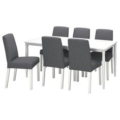 a white table and six chairs with grey upholstered seats