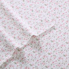 the fabric is white with pink flowers on it