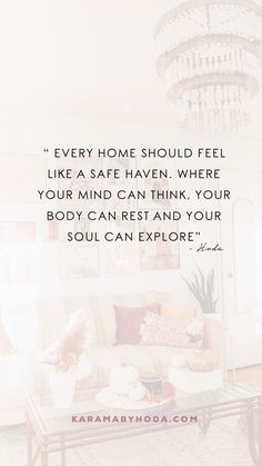 a living room with a chandelier hanging from the ceiling and a quote about how to